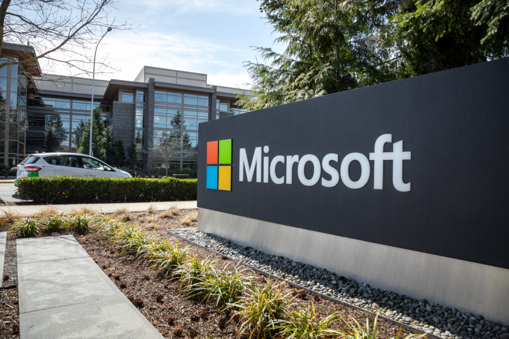 Microsoft headquarters in Redmond, Washington, with commuters in the background, on March 28, 2019
By Peter